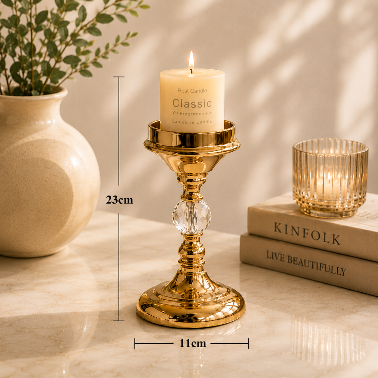 Elegant gold candle holder measuring 23cm high with crystal detailing and decorative pillar candle