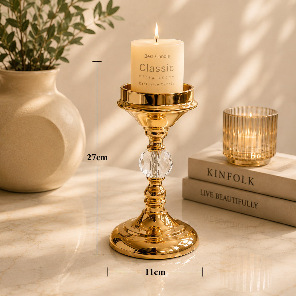 Elegant gold candle holder measuring 27cm high with crystal detailing and decorative pillar candle