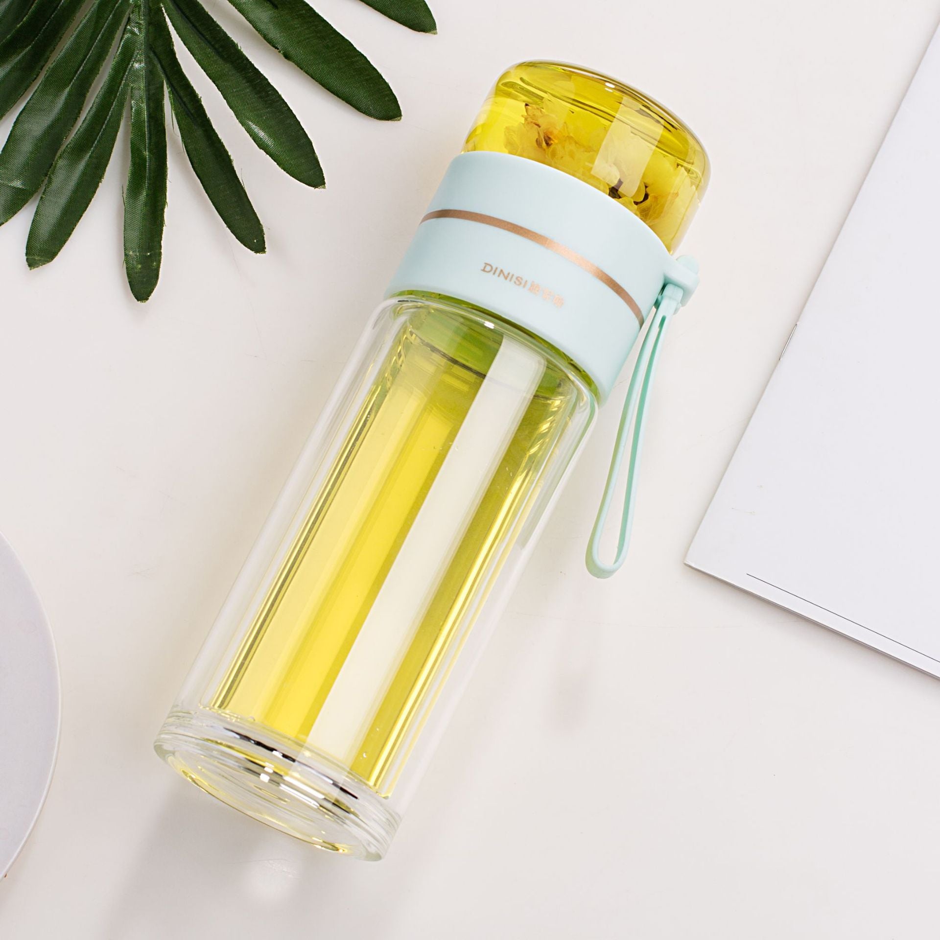 Glass water bottle with built-in tea infuser and leakproof lid for tea, fruit-infused water and everyday hydration
