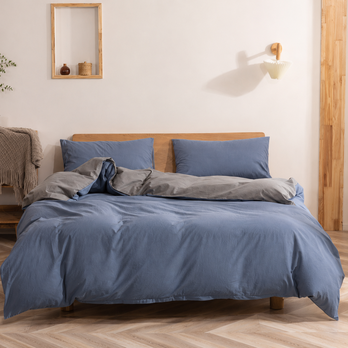 Dusty blue cotton bedding set displayed in a bright contemporary bedroom