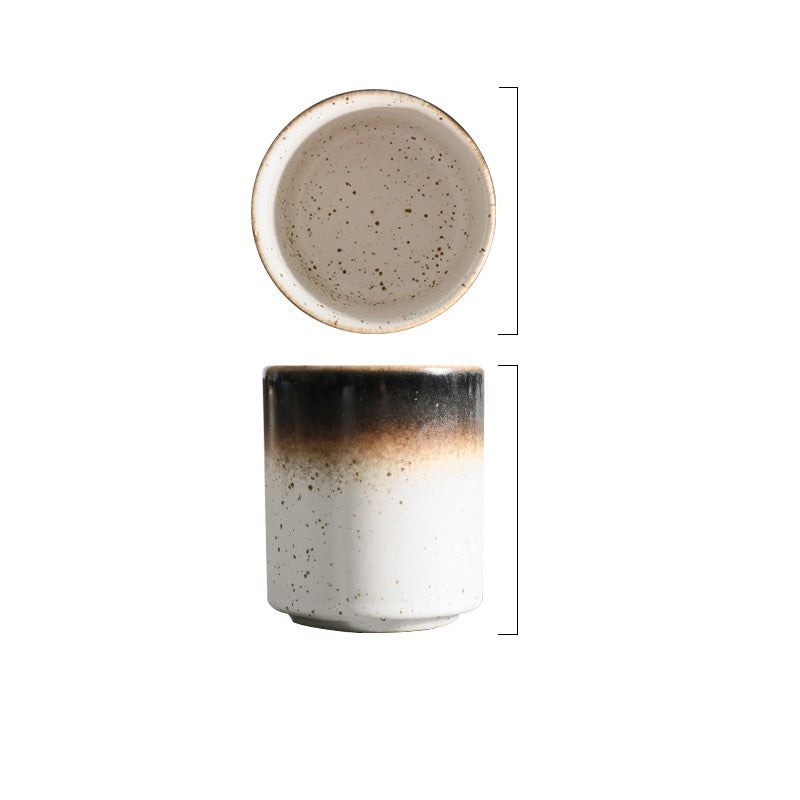 Artisan stoneware ceramic tea and coffee cups with textured minimalist design in assorted neutral colours