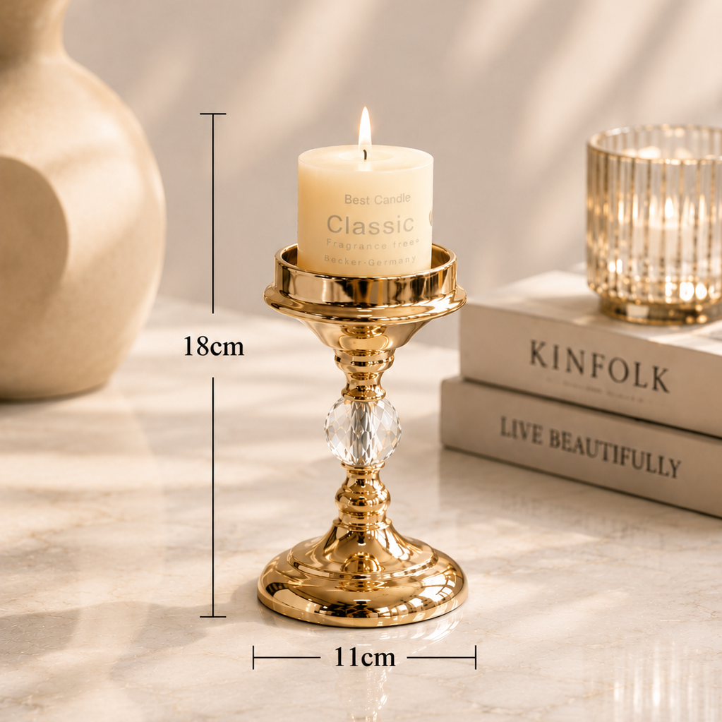 Elegant gold candle holder measuring 18cm high with crystal detailing and decorative pillar candle