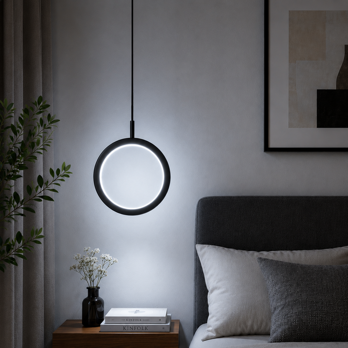 Modern ring-shaped LED pendant light with cool white illumination in a contemporary bedroom