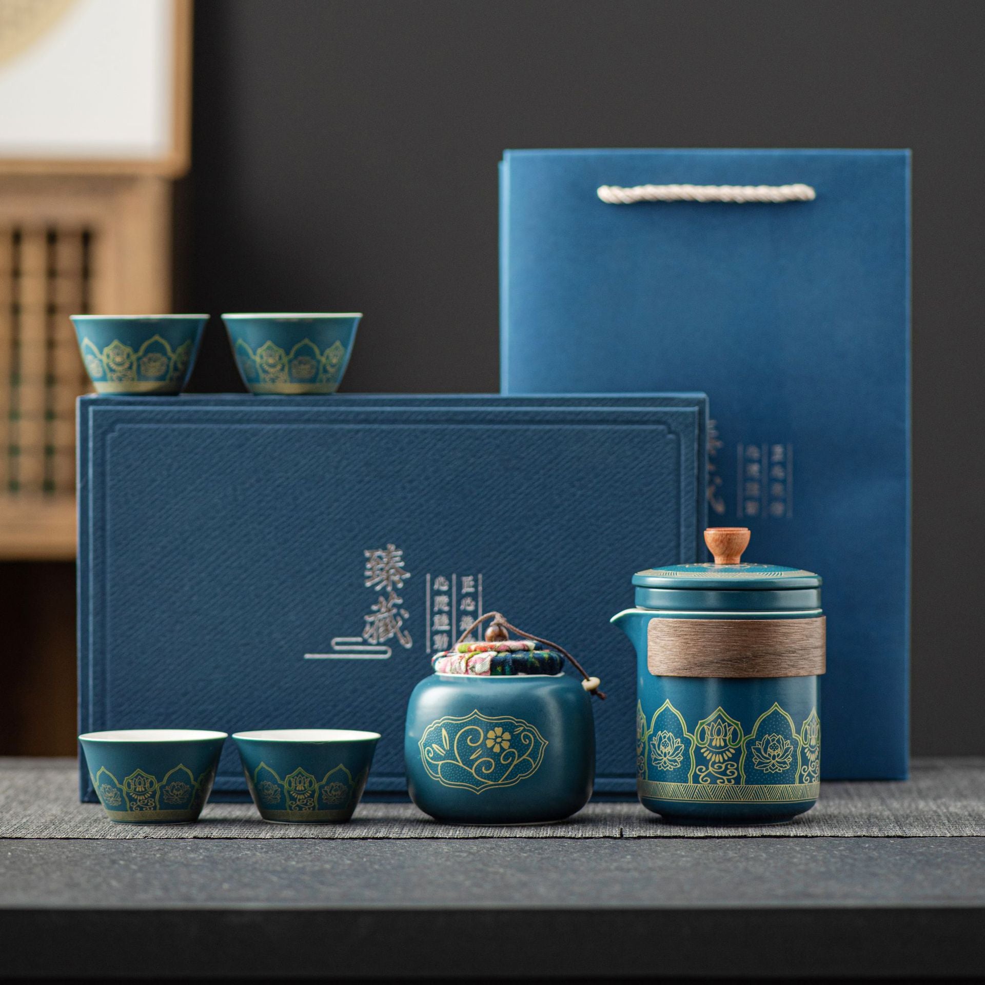 Blue ceramic tea ceremony gift set with matching teacups and storage canister in luxury presentation box
